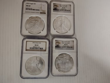 (4) graded silver eagles