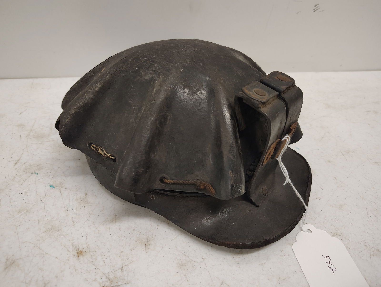 mining hat: turtle shell has a tear in the back
