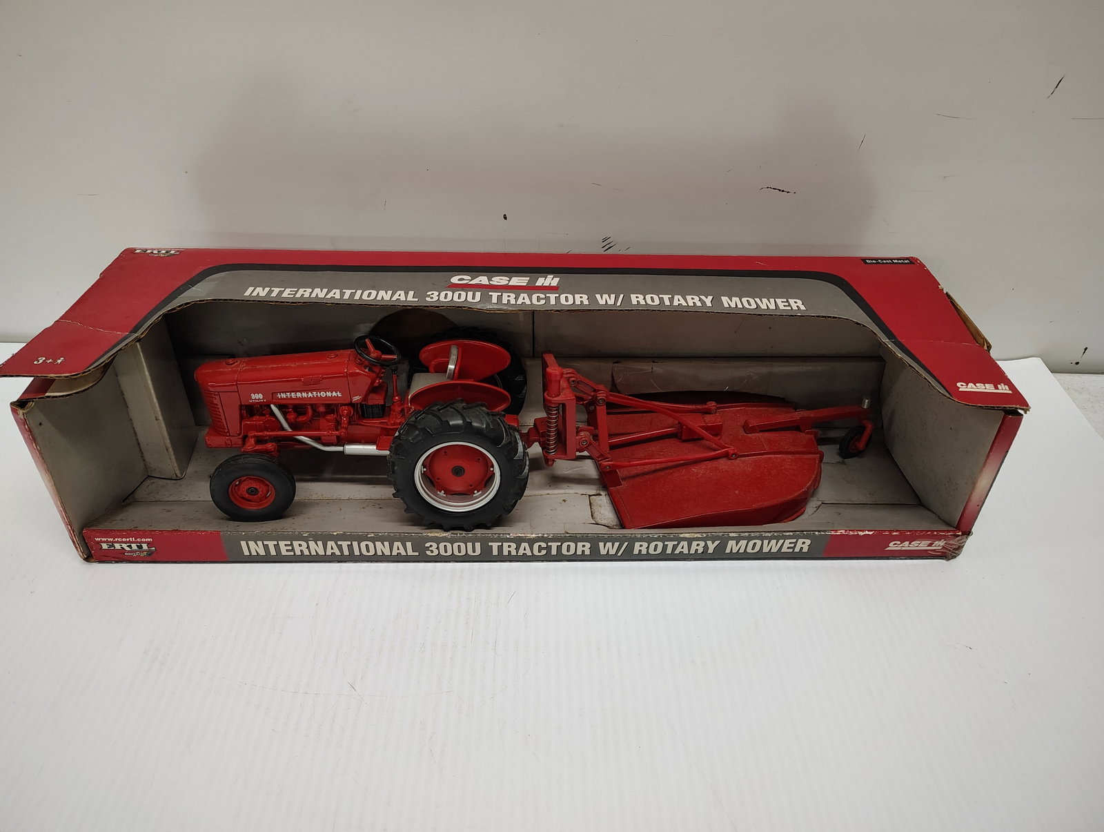 toys: international 300 u tractor w/ rotary mower
