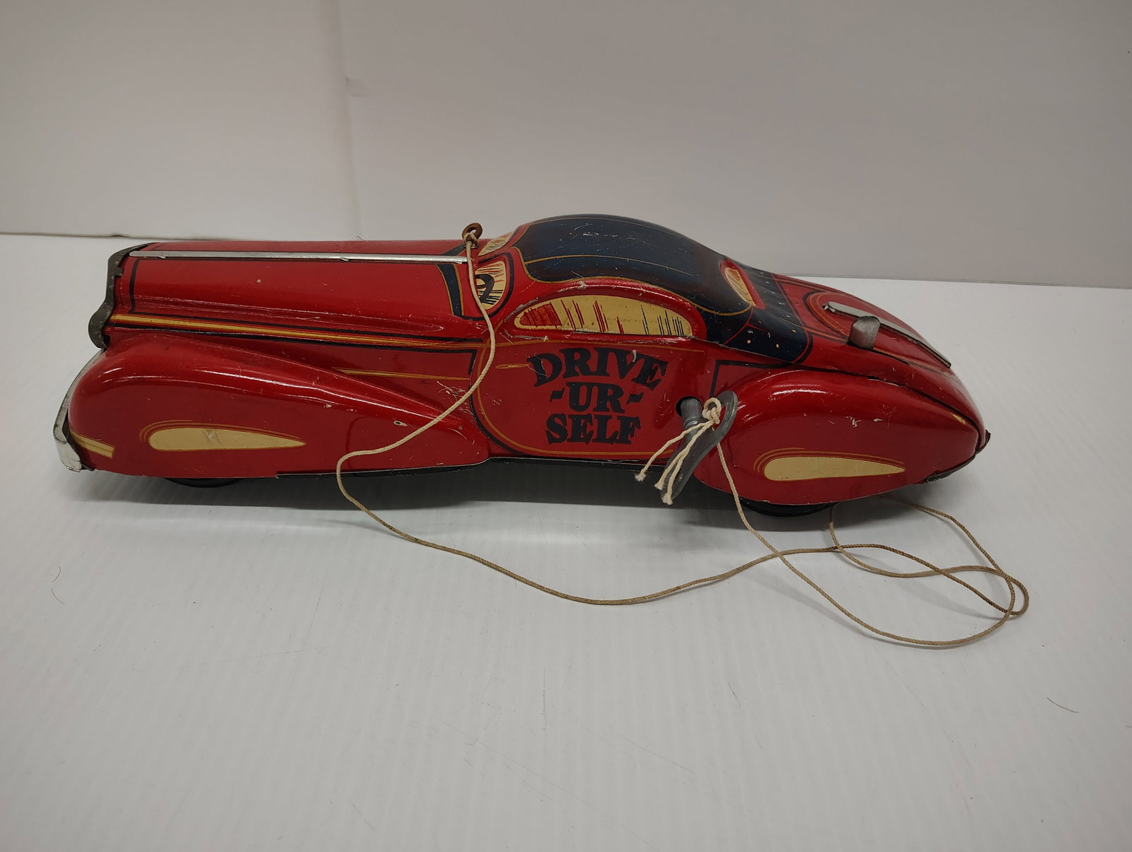 toys: marx drive ur self with working wind up- toy is in good condition