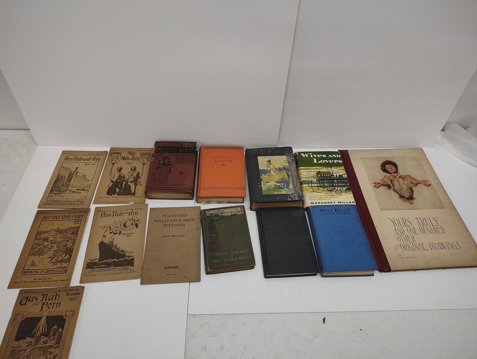 books: "Little Dorrit" by Charles Dickens, "Life with Father" by Clarence Day, "Moby Dick" by Herman Melville (The Fairmont Classics), "Murder Wears a Mummers Mask" by Brett Halliday, "Miss Billy" by Elenore