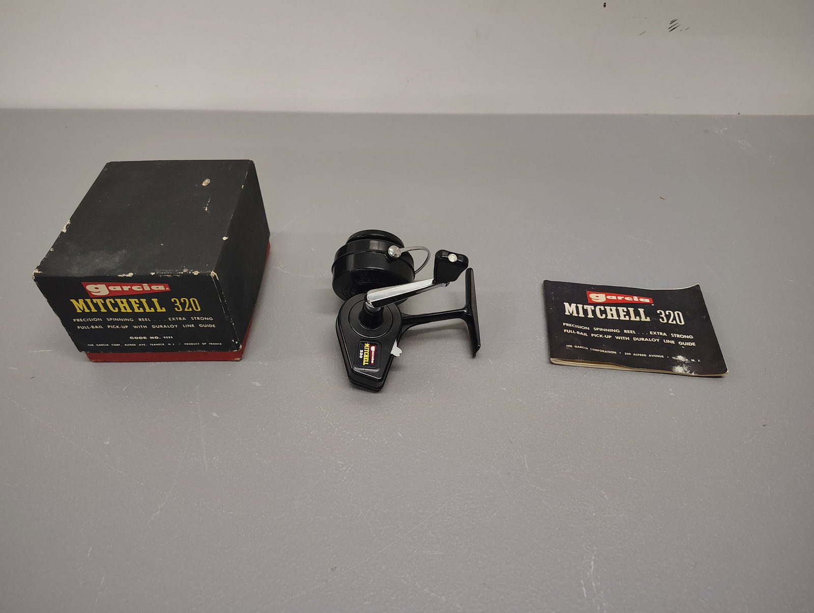 Fishing items: Garcia MItchell 320 never been used with original box
