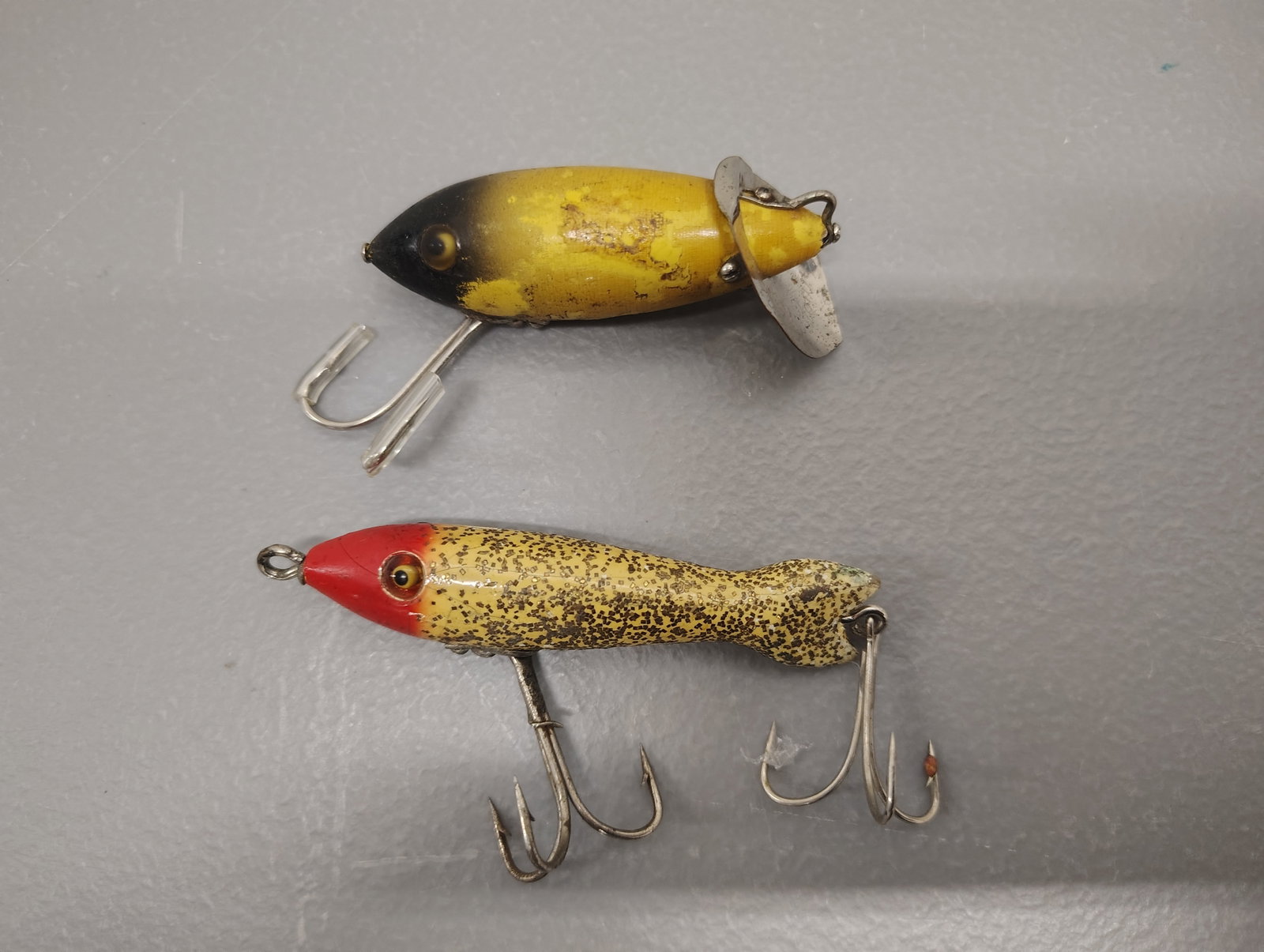 Fishing items: Heddon little mary wooden Heddon peep-o-diver wooden