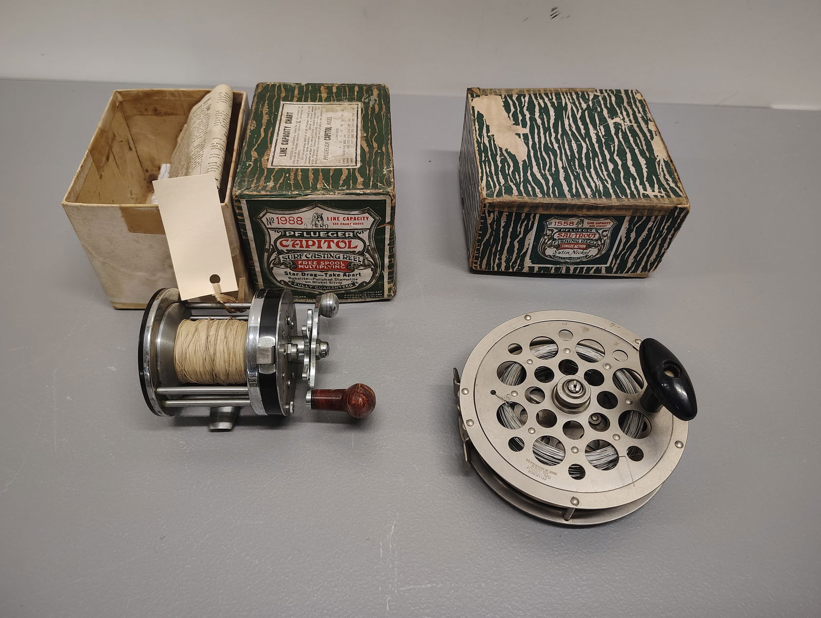 Fishing items: no.1988 pflueger capitol no.1558 pflueger sal-trout