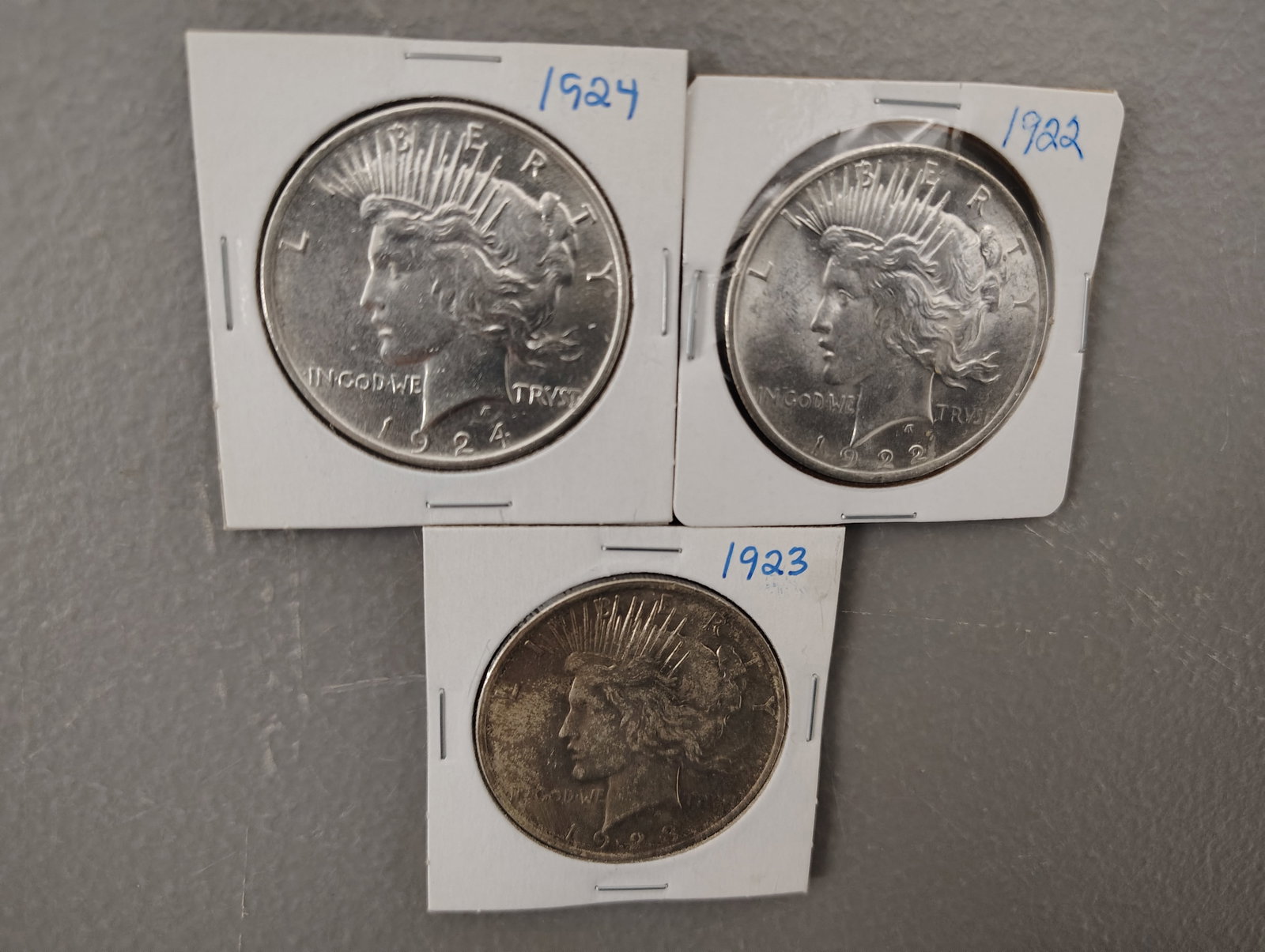 Coins: 3 peace dollars 1922 1923 194