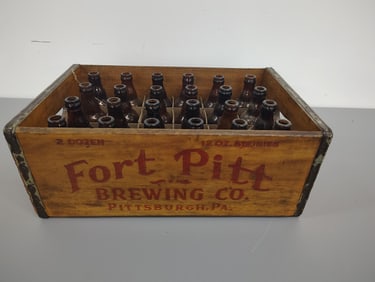 Wooden crate with bottles