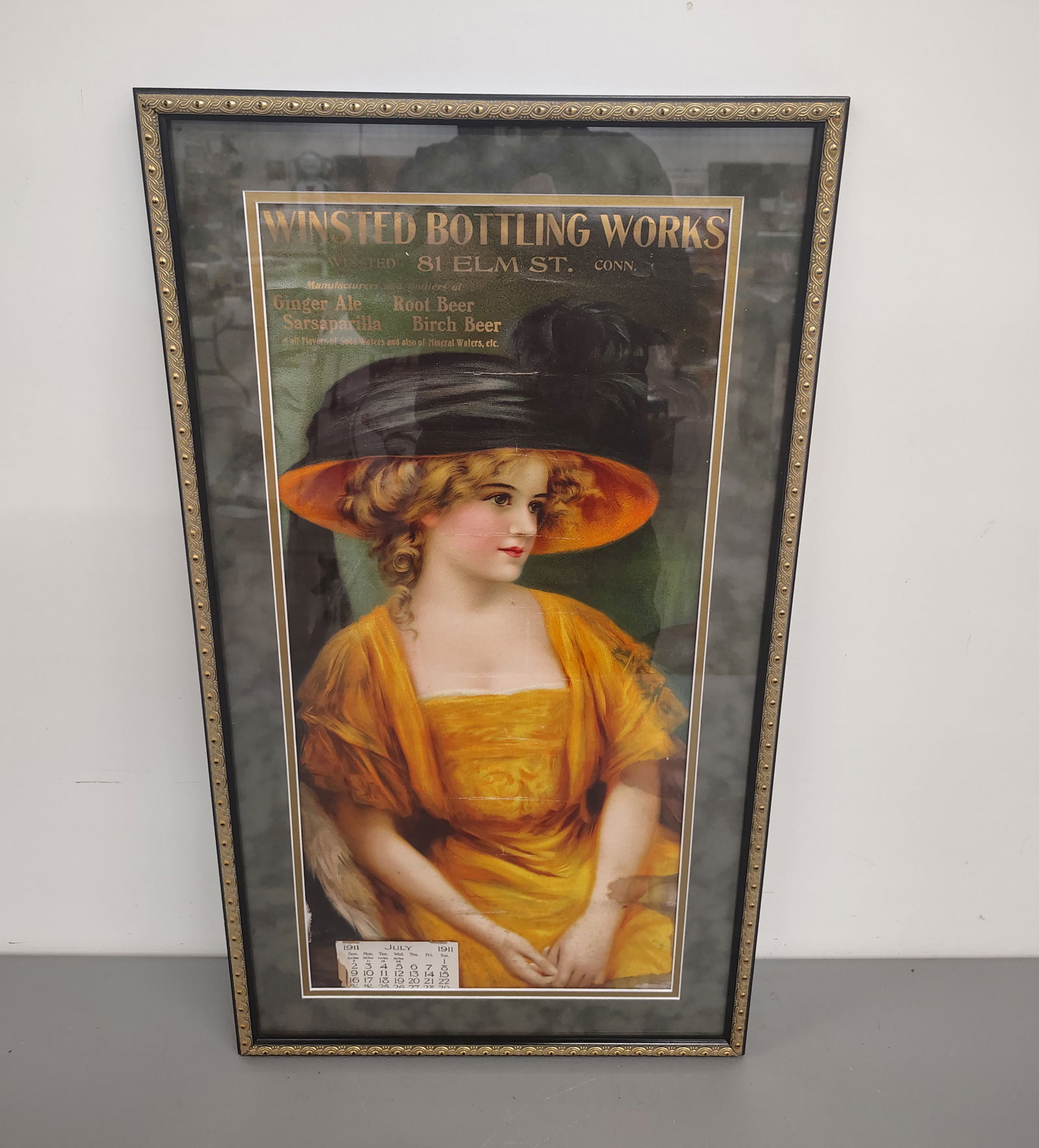 Calandar: 1911 Winsted Bottling Works framed calendar has some water staining