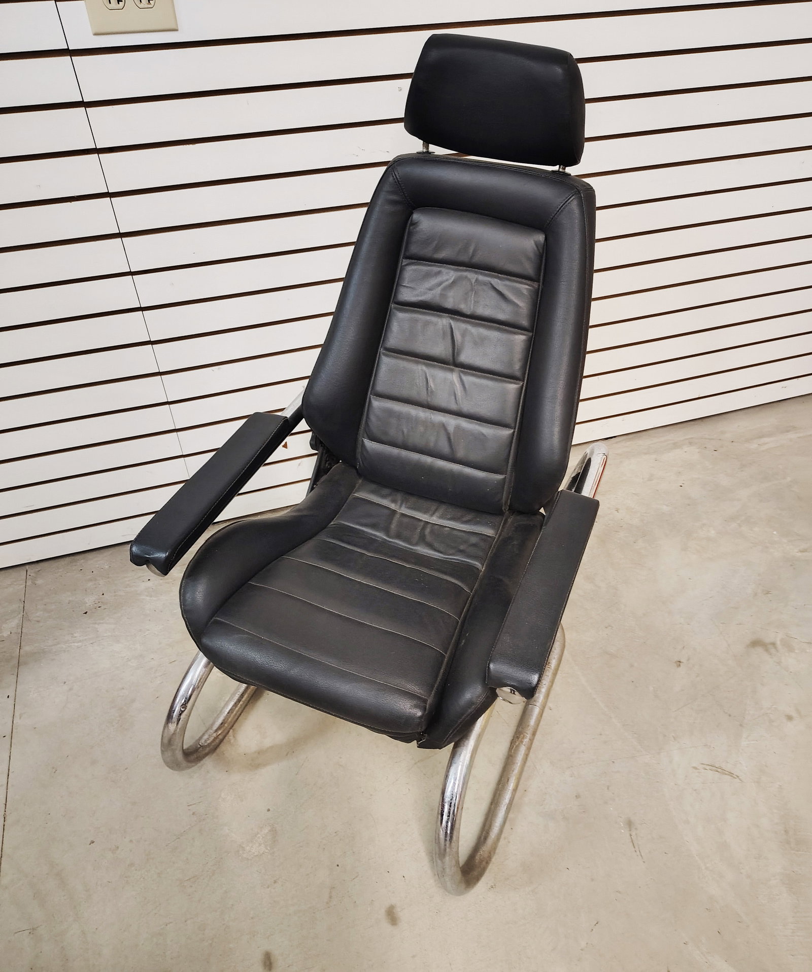 Sports car seat: Adjustable sports car bucket seat custom made for a 1960s-1970s speed shop.