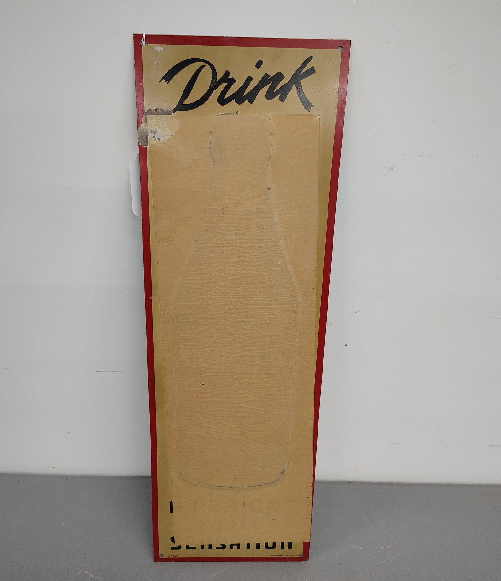 Sign: Nichol Cola still has the paper on it