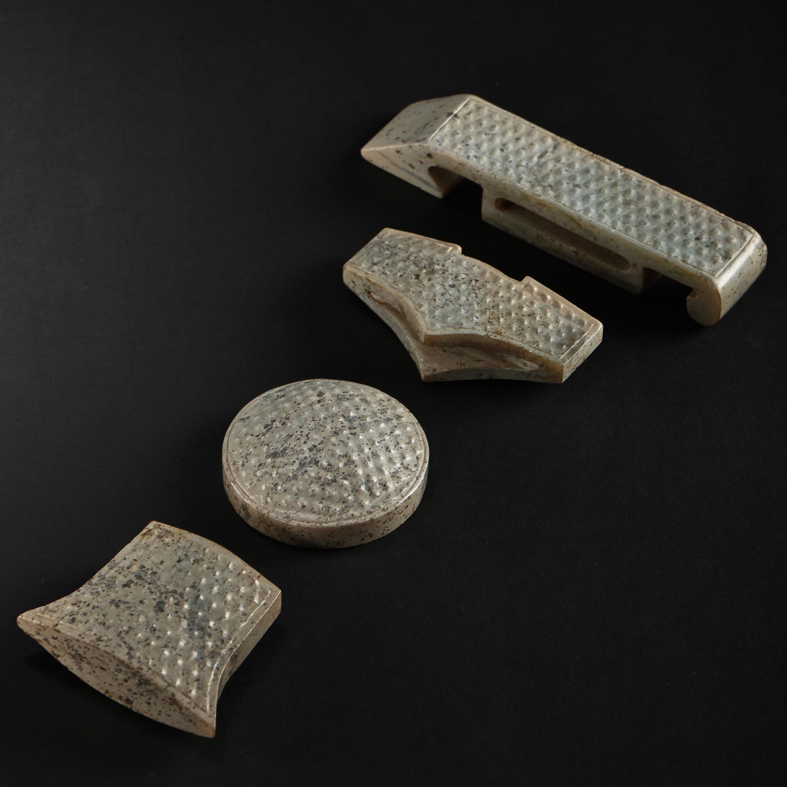 A group of Chinese Han Dynasty Hetian jade sword ornaments (1 of 12)