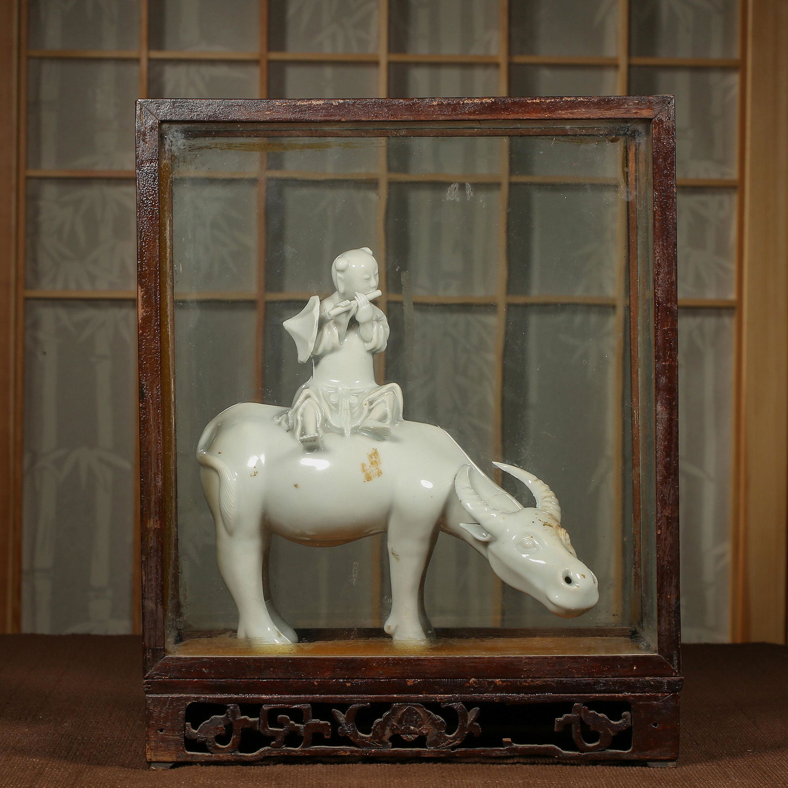 Statue of a boy riding an ox in Dehua kiln in Qing Dynasty (1 of 15)