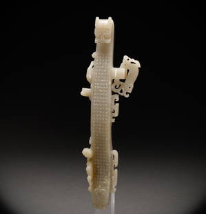 Hetian Jade Belt Hook before the Ming Dynasty: Height: 23cm, Width: 6.5cm, Weight: 175g