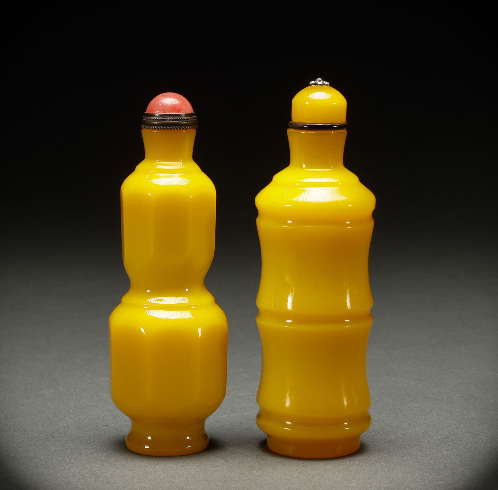 A set of Qing Dynasty chicken oil yellow glazed snuff bottles (1 of 8)