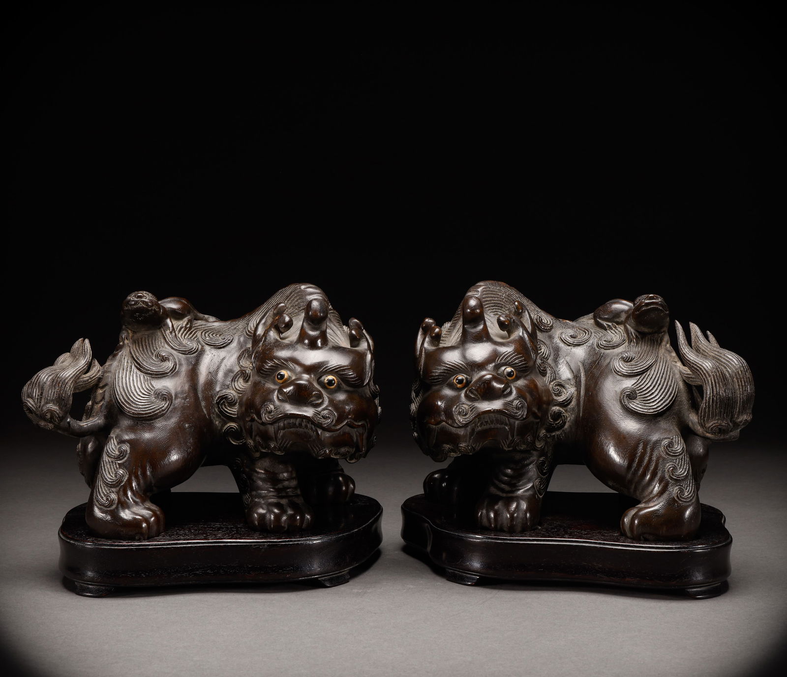 A pair of agarwood lions from the Qing Dynasty (1 of 12)