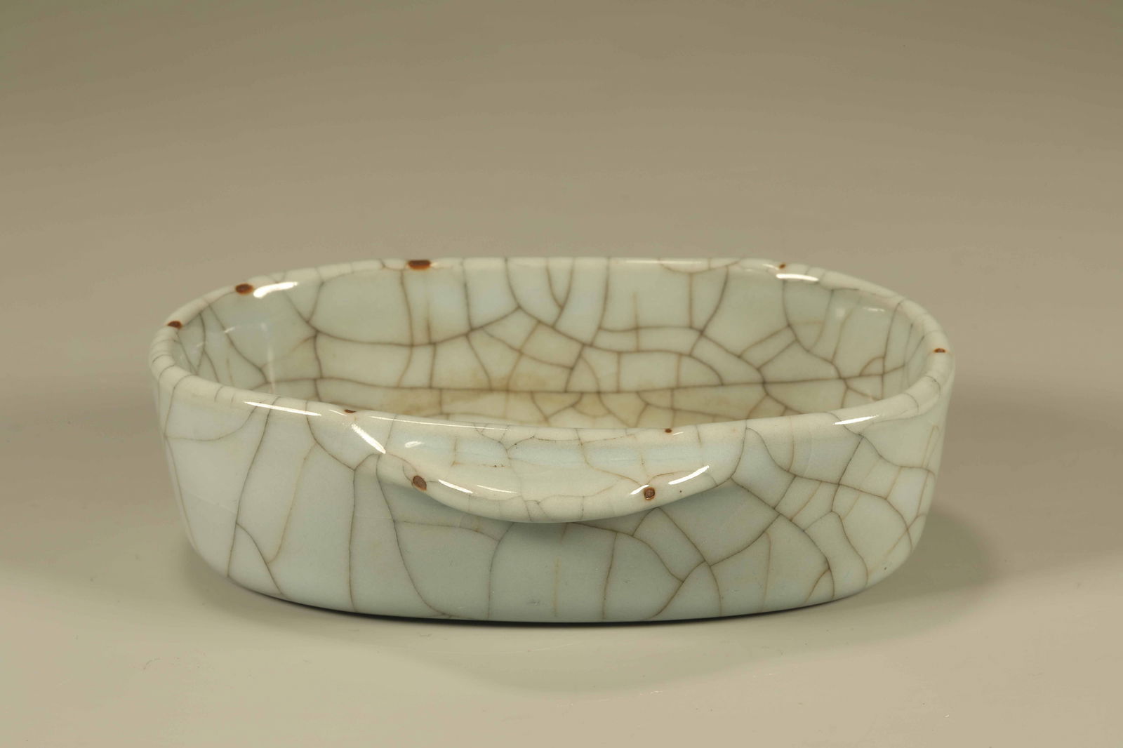 Qing Dynasty imitation official kiln opening ear cup: Length: 12cm, Width: 10cm,