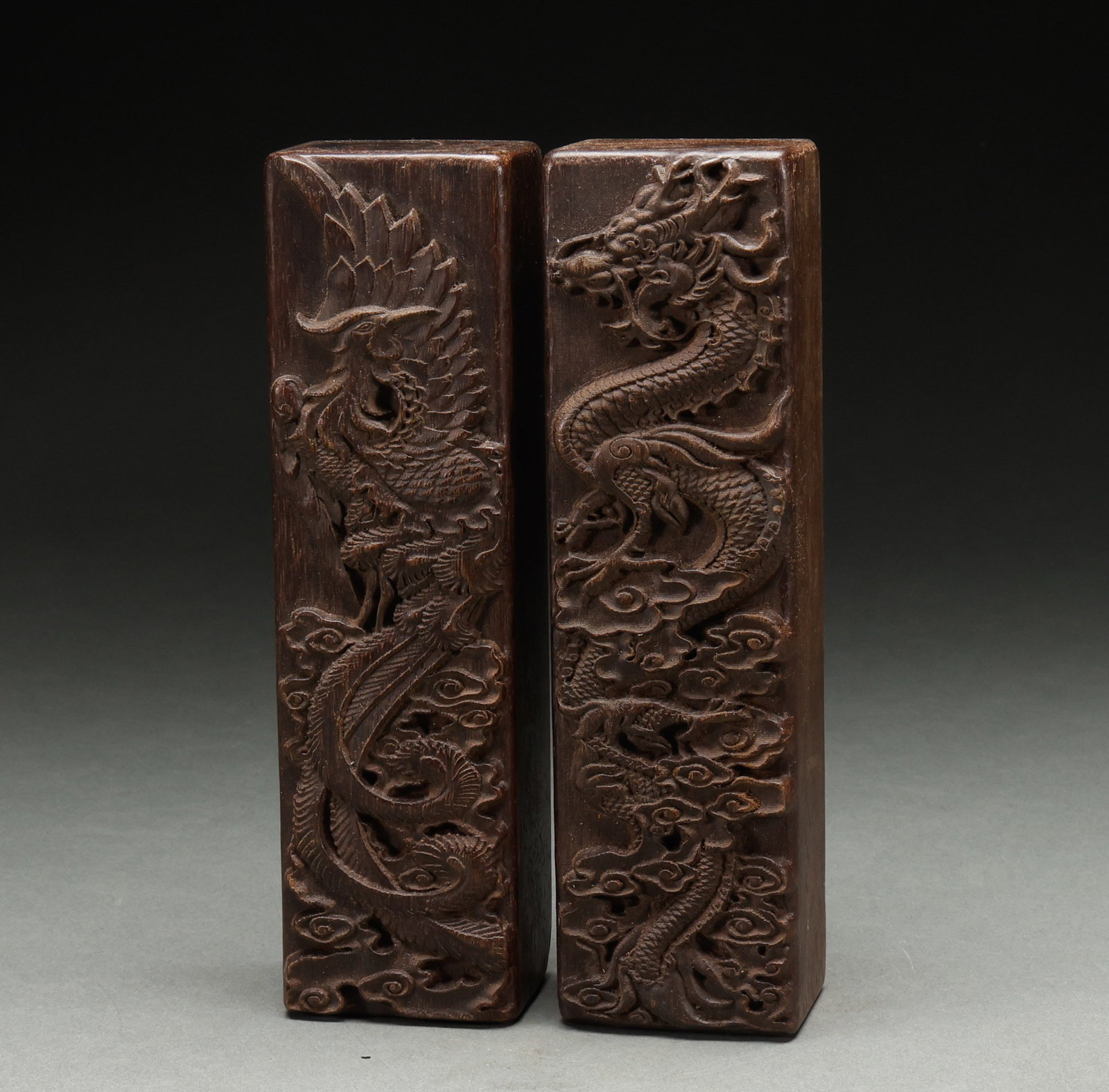 A pair of Qing Dynasty agarwood dragon and phoenix patterned rulers: Height: 20.5cm, Width: 5cm, Weight: 952g