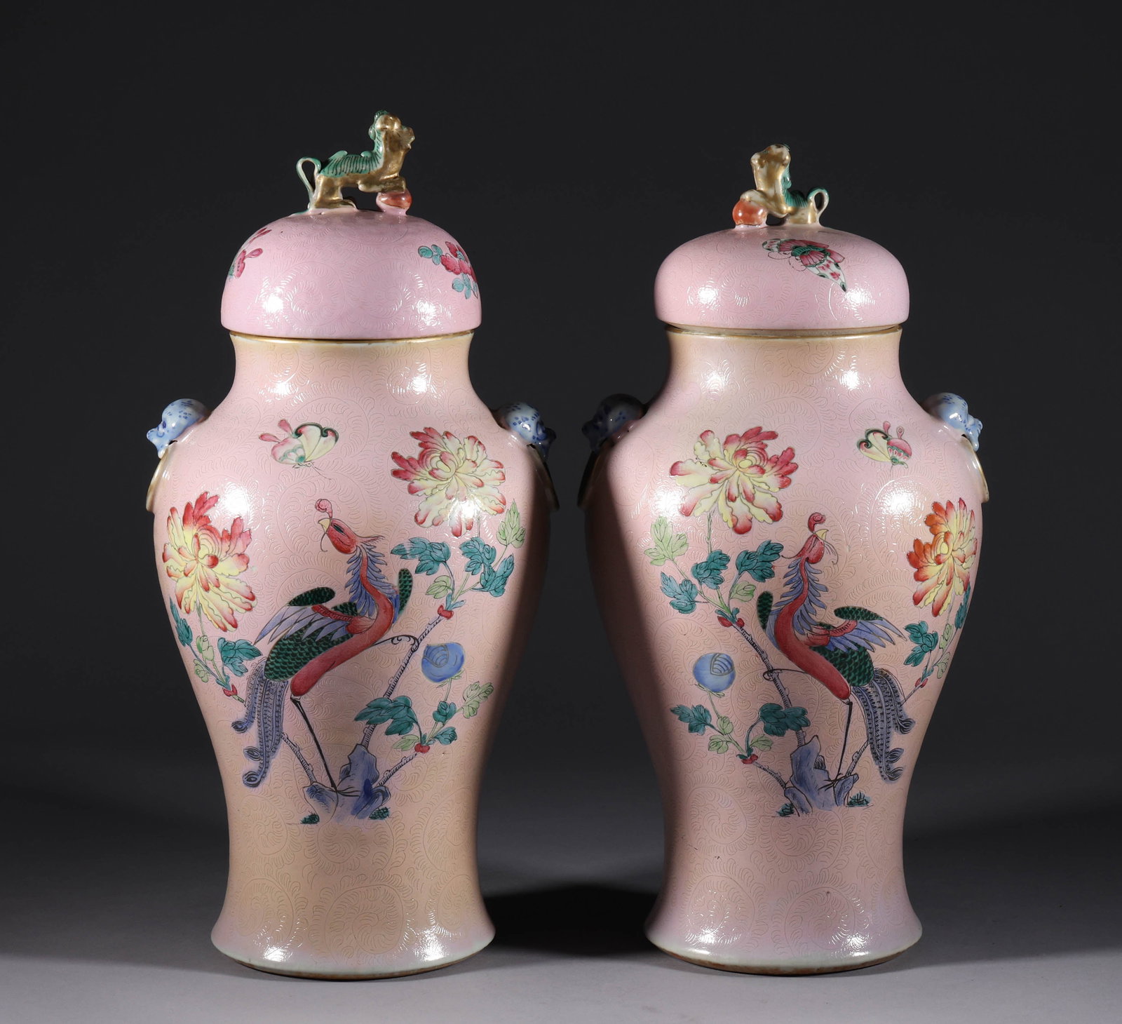 A pair of Qing Dynasty pink peacock patterned bottle caps (1 of 8)