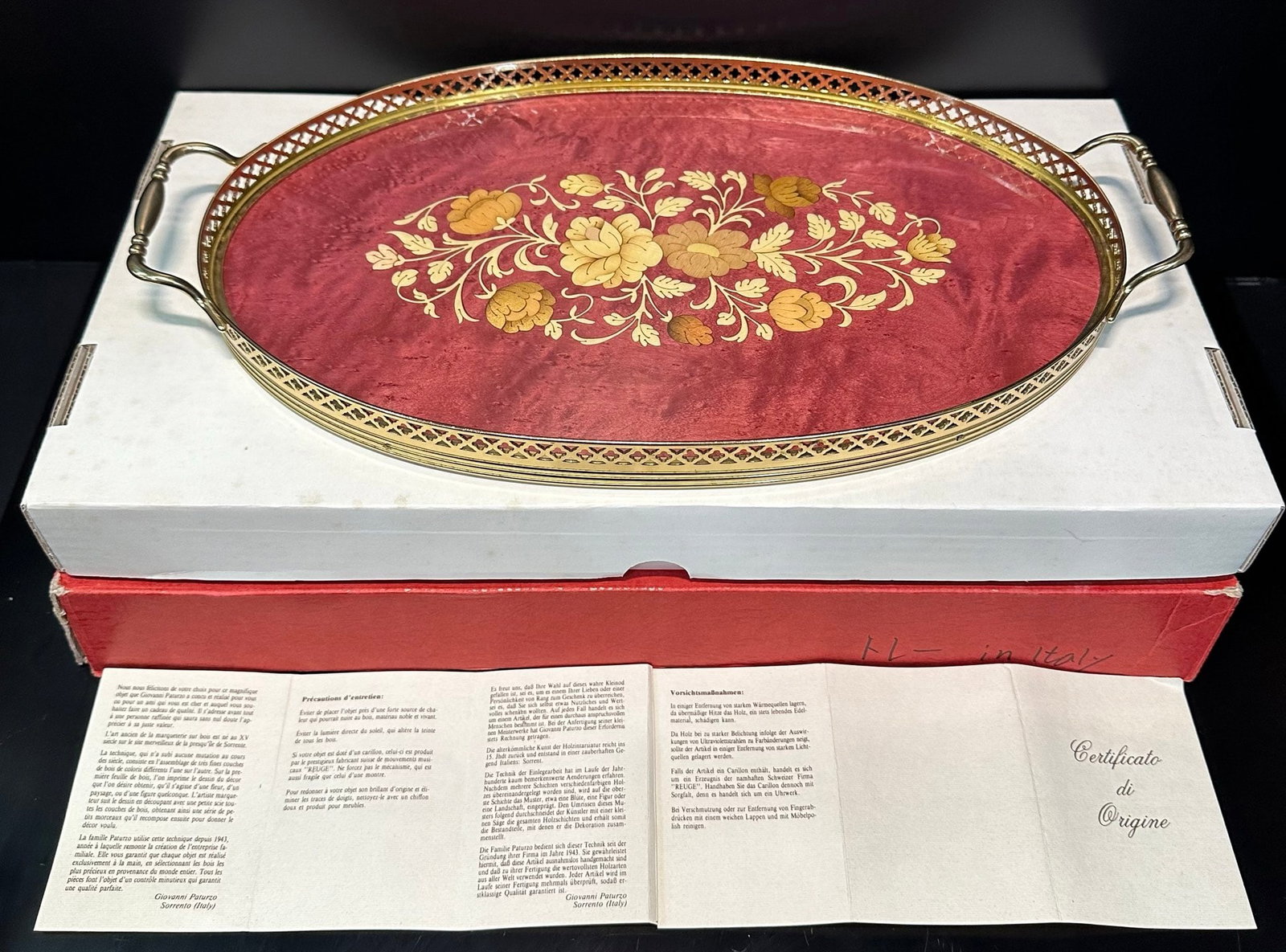 Italian wooden copper inlaid Soren tray: Giovanni Patruzo Sorrento handmade decorative tray from Italy. This oval shaped decorative tray measures approximately 40 centimeters in length and 22 centimeters in width, with a red velvet base as t