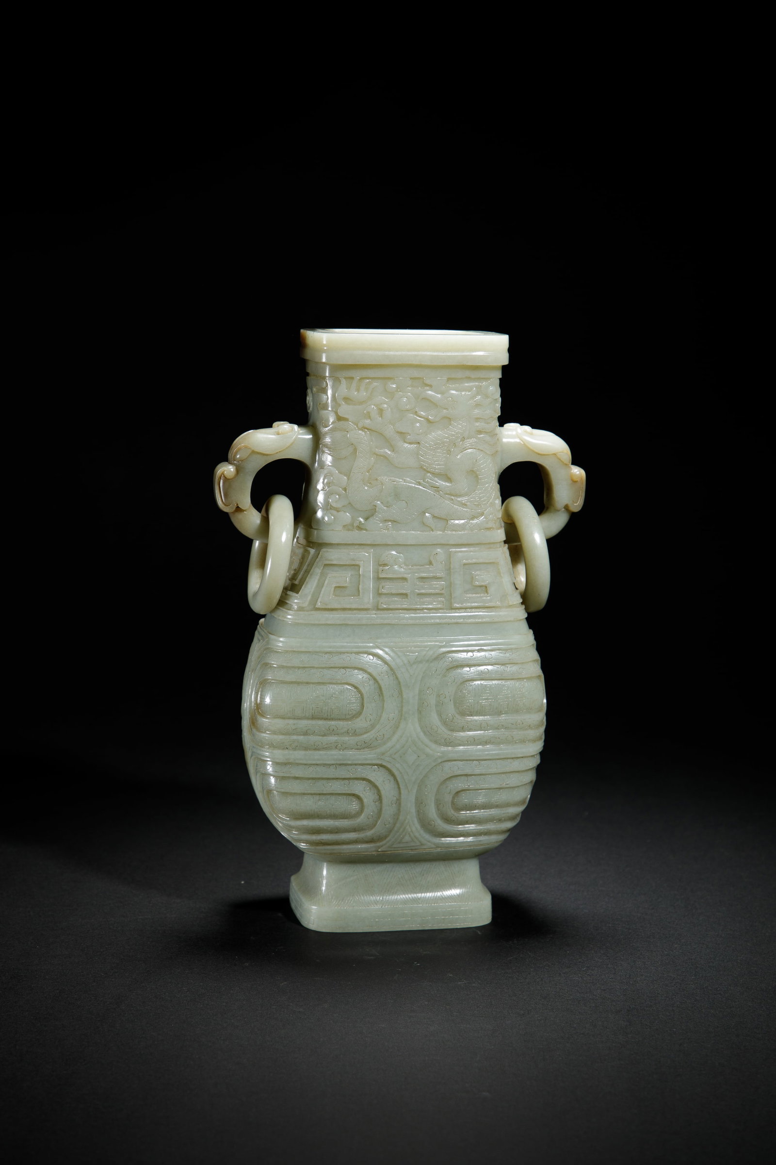 Qing Dynasty Hetian Yuxi Handle Bottle: Qing style Hetian green white jade beast with a live ring and antique flat pot (jade flat bottle)The type of vessel originated from the Shang and Zhou dynasties' bronze throwing pot and bronze pot, wh