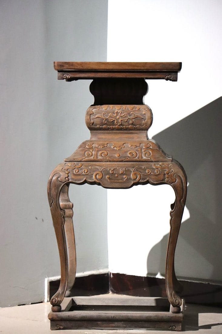 Qing Dynasty Huanghua Pear Fragrant Table: Ancient wood carving with entwined branches and three curved legs, fragrant tableSpecification: 100-48cm in height and width, with auspicious relief patterns throughout the body, three curved legs wit