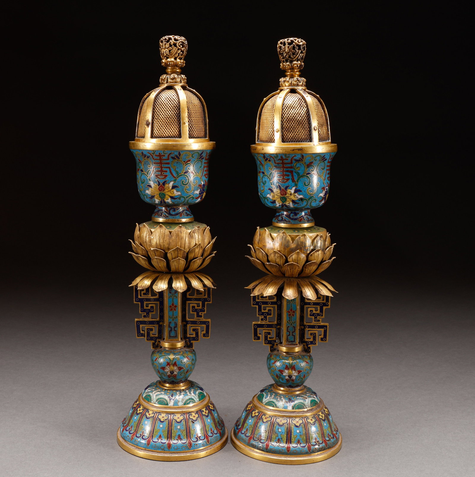 A pair of copper cloisonn ?? fumigation furnaces from the Qing Dynasty: Copper gilded cloisonn enamel multi-layer lotus longevity character fumigation furnace pairedSpecifications range from 39cm in height to 11cm in width, with a total weight of 3079g. It features a mult
