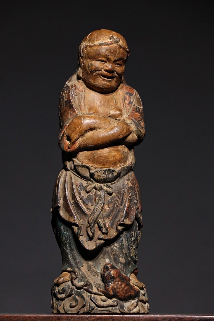 Wooden painted bangs statues before the Ming Dynasty: The old Tibetan painted wood carving Liu Hai Xi Jin Chan ornament, with a height of 28cm and a width of 10cm. The whole wood carving depicts the joyful and lively expressions of the characters, with a