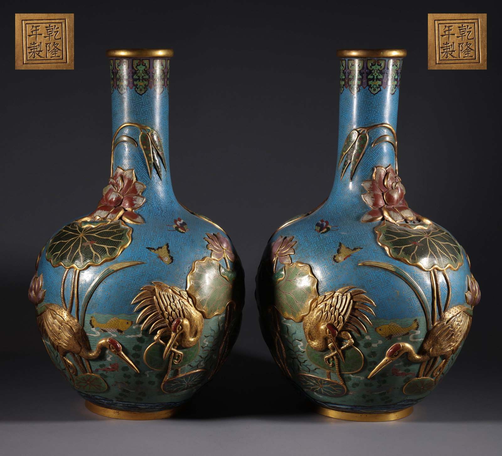 Qing Dynasty Copper Tire Jingtai Blue Sky Ball Bottle: A pair of Qing Qianlong style copper body cloisonn ?? enamel gilded relief lotus pond crane sky ball bottles, each measuring 62cm in height, 35cm in width, and weighing 17704g. The bottle features a s
