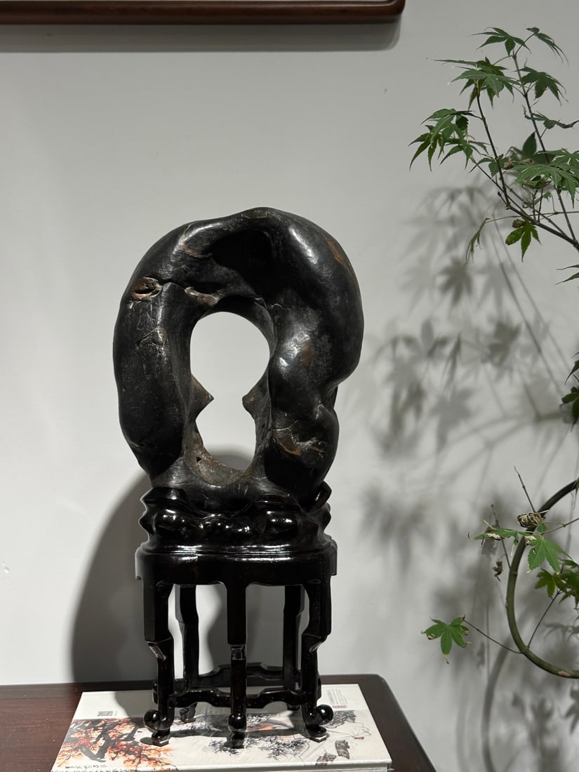 Qing Dynasty Rare Stone Ornaments: Qing-Dynasty Scholar's Stone Ornament. Lofty in style and timeless in appeal, the piece stands 47 cm tall, and is 21 cm wide. Firm in substance and pleasantly glossy, natural in form, a fine piece for