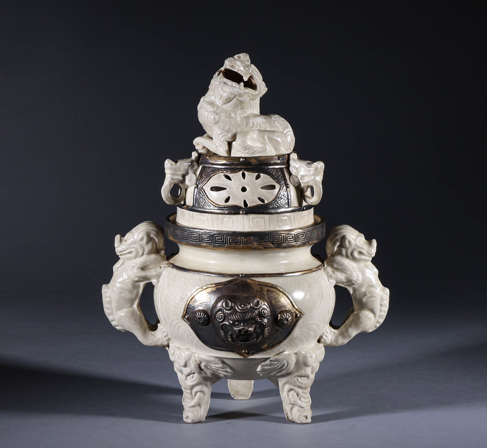 Song Dynasty Ding Kiln Beast Ear Furnace: Song-Dynasty Ding Kiln Beast-Eared Censer. With a quiet, dignified air of refined elegance, the piece stands 37 cm tall, is 27 cm wide, and weighs 2,530 g. The glaze is moist, the enamel vivid, the pa