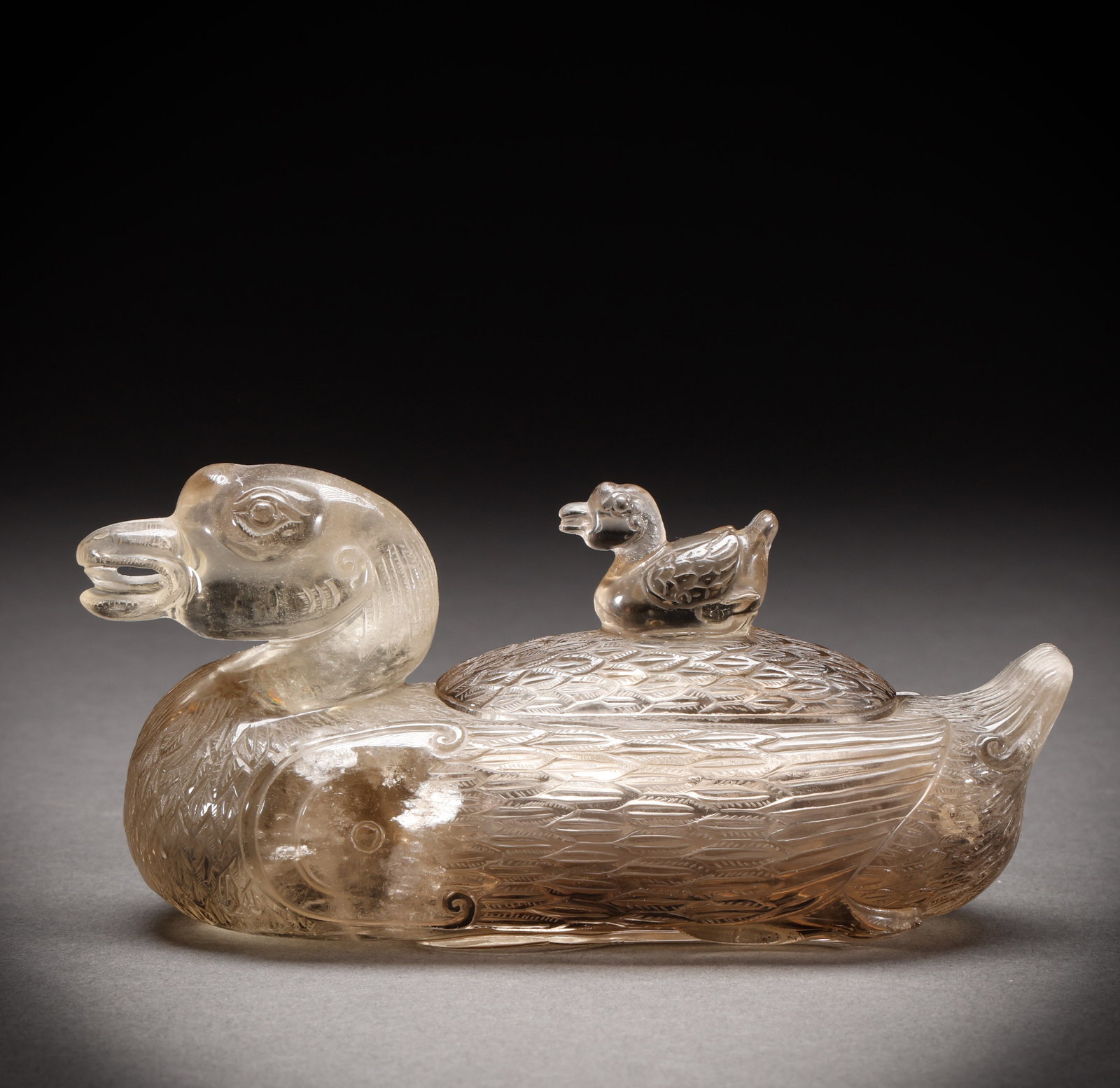 Qing Dynasty crystal duck shaped lid furnace: Qing-Dynasty Rock-Crystal Duck-Shaped Covered Censer. Steeped in antique charm, its patina warm and mellow, the piece stands 6.5 cm tall, is 14.5 cm wide, and weighs 412 g. Precious in material and na