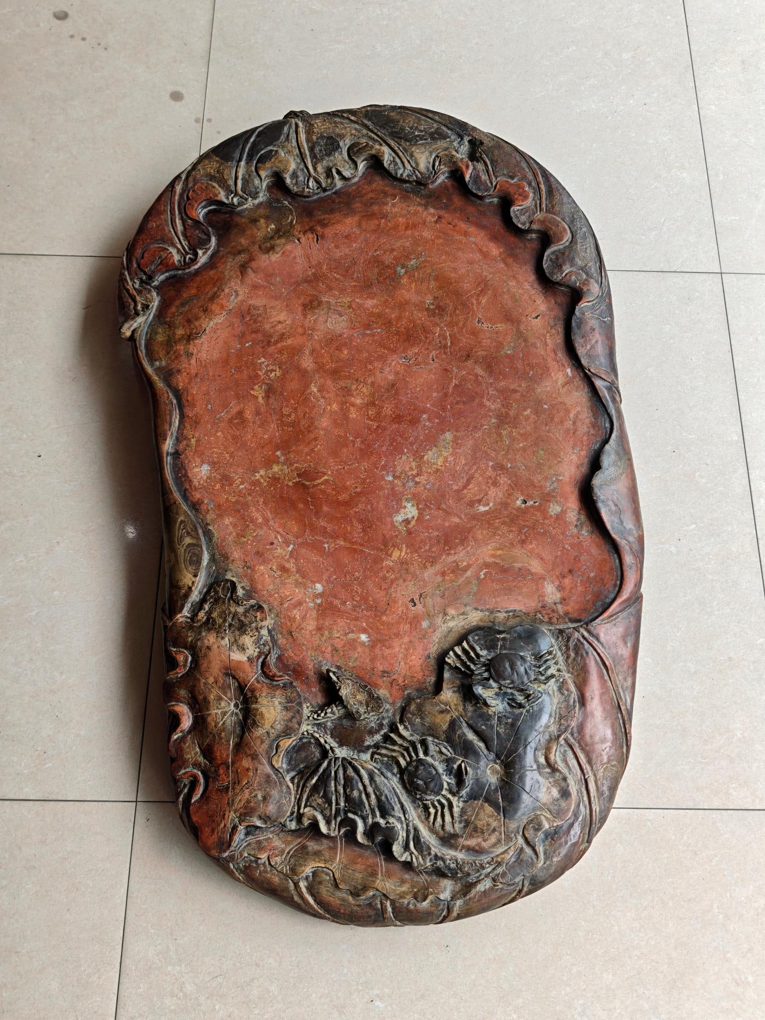 Qing Dynasty stone carving lotus leaf crab lotus pod inkstone: Qing-Dynasty Stone Inkstone with Lotus-Leaf, Crab and Lotus-Pod Motifs. Perfectly formed and full of distinctive charm, the piece measures 90 cm in length, and is 52 cm wide. Steady in tone and full o