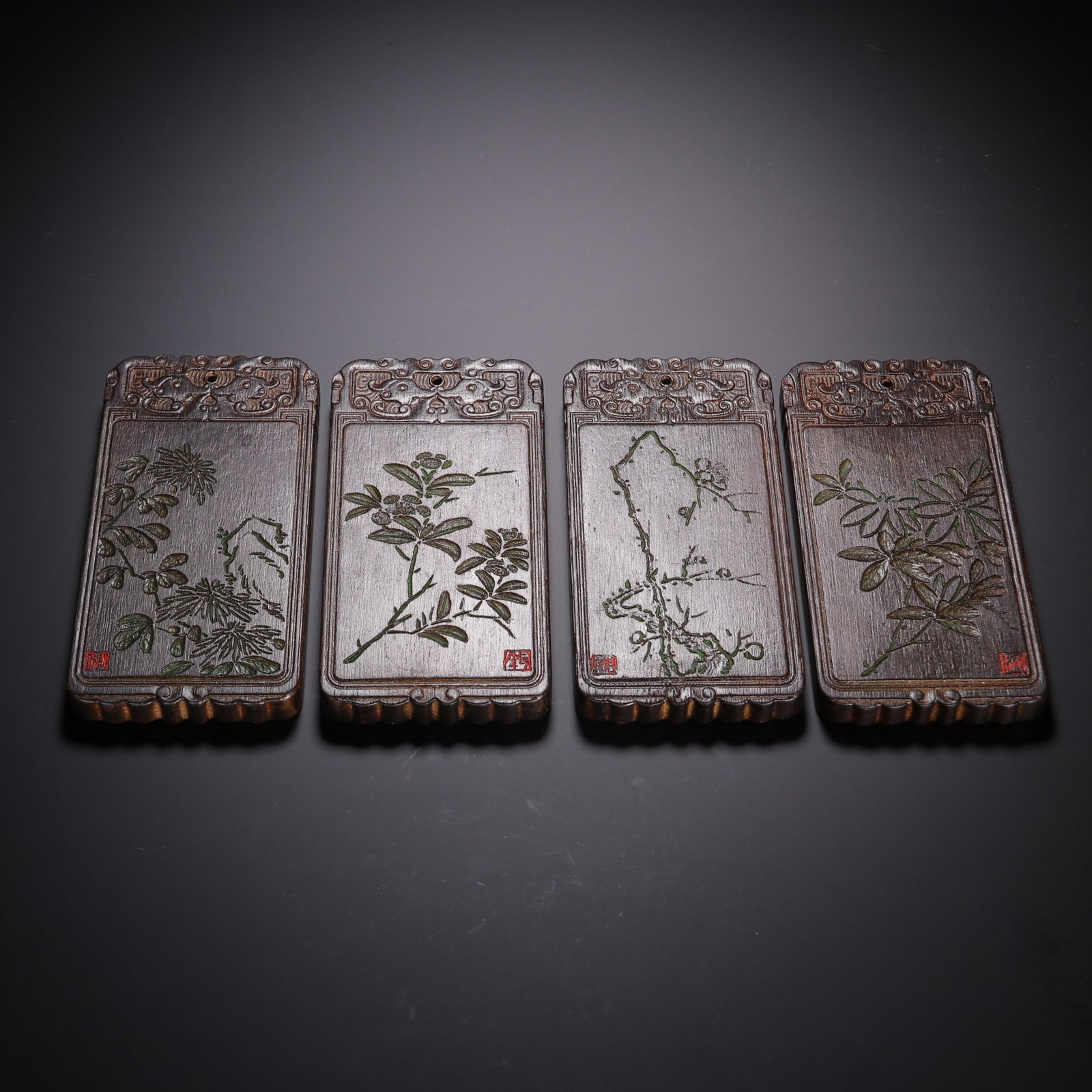 Qing Dynasty Agarwood Carving Four Seasons Flower Pattern Plaque: Qing-Dynasty Agarwood Pendant Carved with Flowers of Four Seasons. Elegant and serene, with a naturally refined bearing, the piece stands 12 cm tall, is 5.8 cm wide, and weighs 267 g. The material is