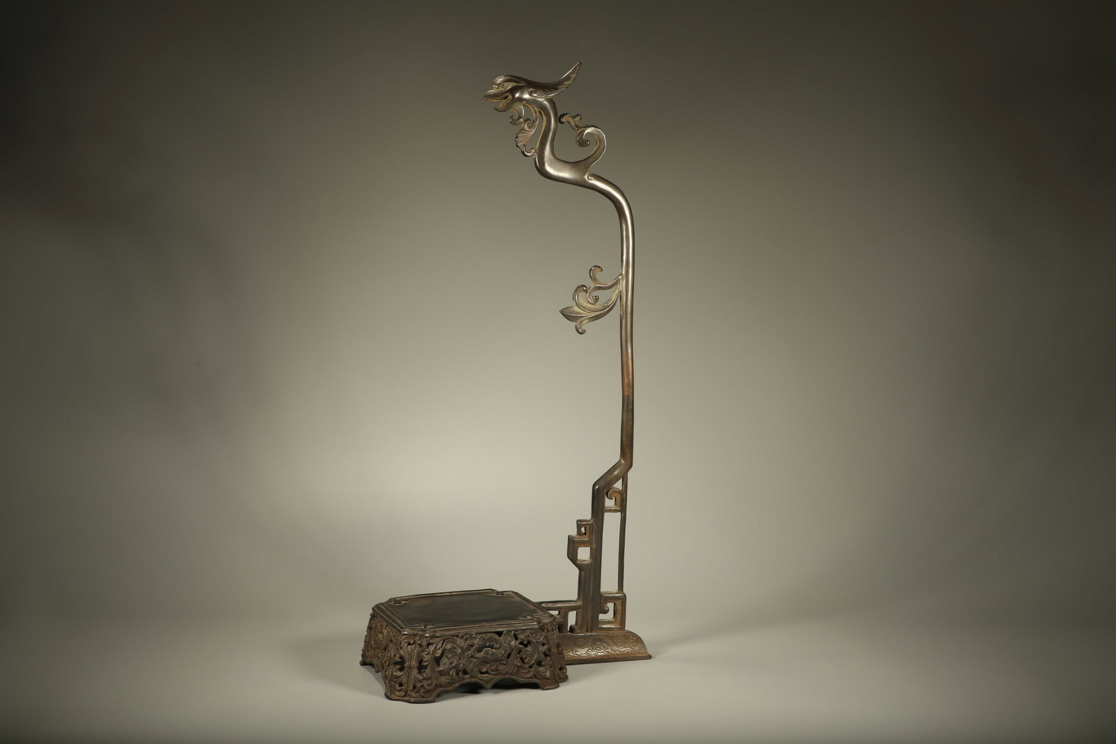 Qing Dynasty Copper Phoenix Pattern Pen Hanging: Qing-Dynasty Bronze Pen Rest with Phoenix Motif. With a quiet, dignified air of refined elegance, the piece stands 50 cm tall, and is 23 cm wide. The form is robust, the decoration refined, the patina