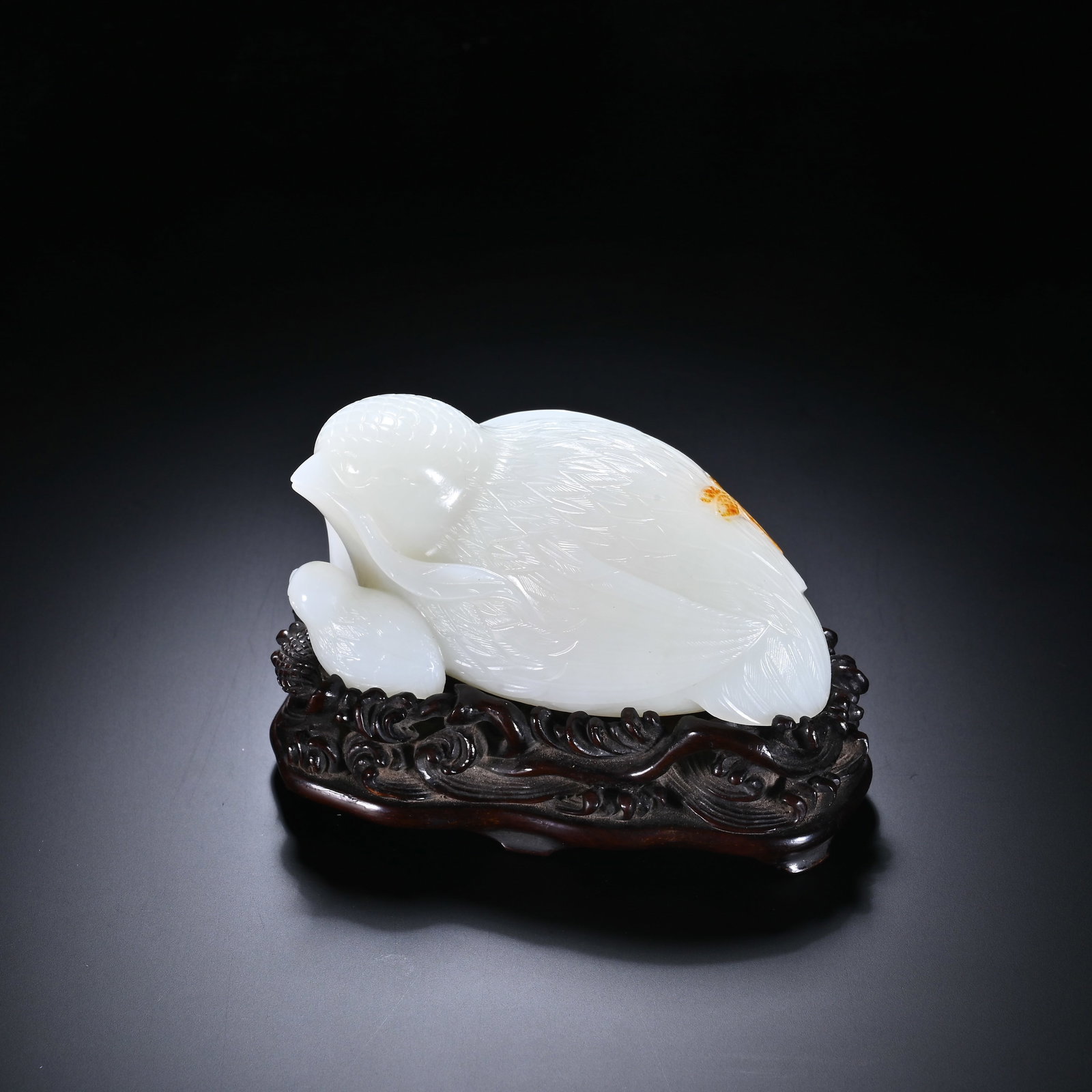 Qing Dynasty Hetian White Jade Quail Ornament: Qing-Dynasty Hetian White Jade Quail Ornament. Steeped in antique charm, its patina warm and mellow, the piece stands 4.3 cm tall, and is 9.5 cm wide. The tone is rich and the lapidary work superb, th
