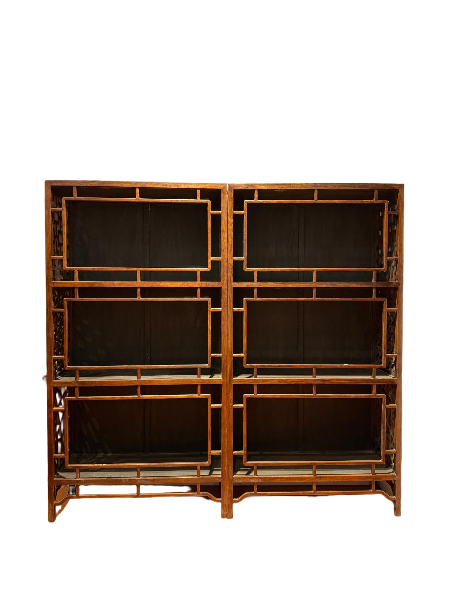 A pair of Qing Dynasty Huanghua Pear Ten Thousand Character Pattern Bookcases (1 of 5)