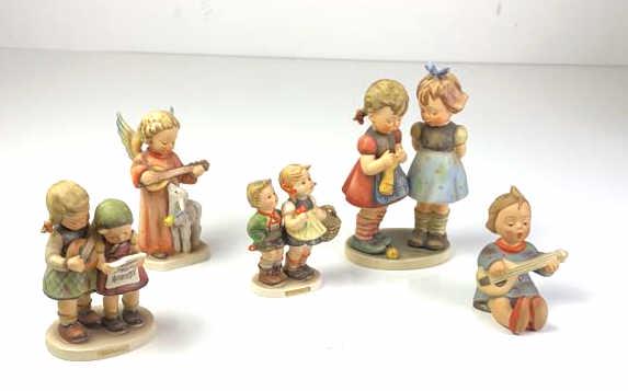 Group of 5 Hummels Including knitting lesson, to market and close hae]rmony, etc Tallest is 7 3/8" (1 of 7)