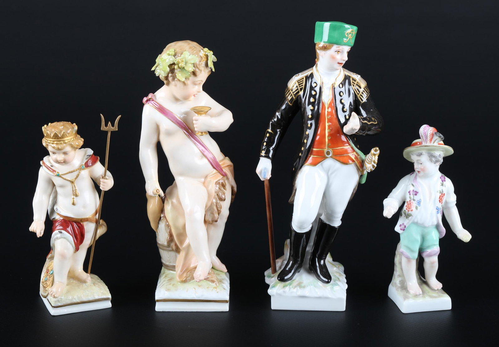 KPM Berlin - 4 Figuren, lot of porcelain figures,: Porzellankonvolut von 4 Figuren, Königliche Porzellanmanufaktur Berlin, blaue Zeptermarke, u.a. mit rotem Reichsapfel, 1x Bergmann, 1x Neptun Putte, 1x Allegorie und 1x Knabe, 4x H 10,5 - 16,5 cm