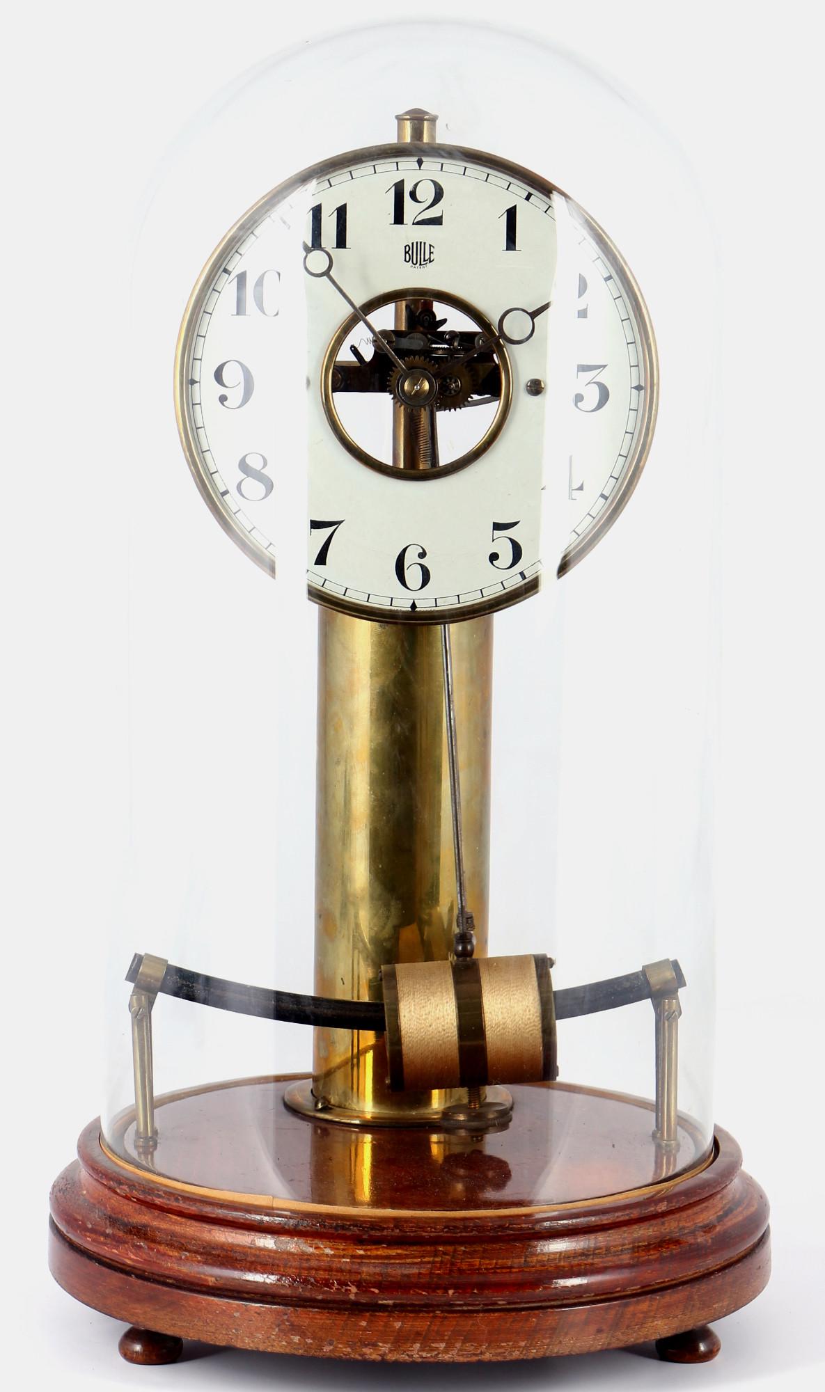 Bulle Clockette, mantel clock, Elektromagnetische Tischuhr,: France 1st half of the 20th century, brass case on a wooden base in the old glass dome, H 39.5 cm x D 22 cm, electromagnetic clockwork with pendulum, dial with Arabic numerals and company name, clock