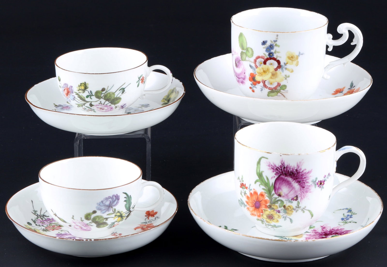 Meissen 18th century Flowers 2 coffee cups and 2 tea cups,: porcelain, blue sword mark around 1720-1774 (coffee cups/saucers with dotted sword mark), decor polychrome flower painting - coffee cups with bouquet of flowers, 2x tea cup H 4.5 cm x D 7 cm, 2x sauce