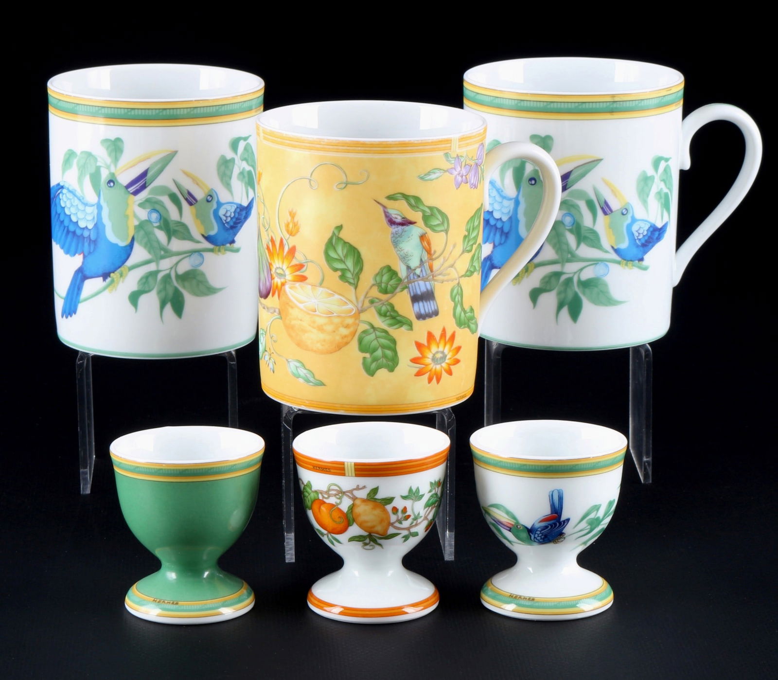 Hermes Paris Toucans / La Siesta 3 coffee mugs with 3 egg cups,: porcelain, France Paris, green / orange company mark, decor Toucans / La Sieste, 3x coffee mugs 9.5 cm x D 7.5 cm, 3x egg cups H 5.5 cm x D 5 cm, slight color abrasion