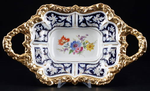 Meissen Flower Bouquet royal blue handled bowl,: porcelain, blue sword mark with two grinding strokes second choice, decor floral painting , partially with royal blue ground, gold spray, H 8.5 cm x L 35.5 cm x W 21 cm, slightly abrasion