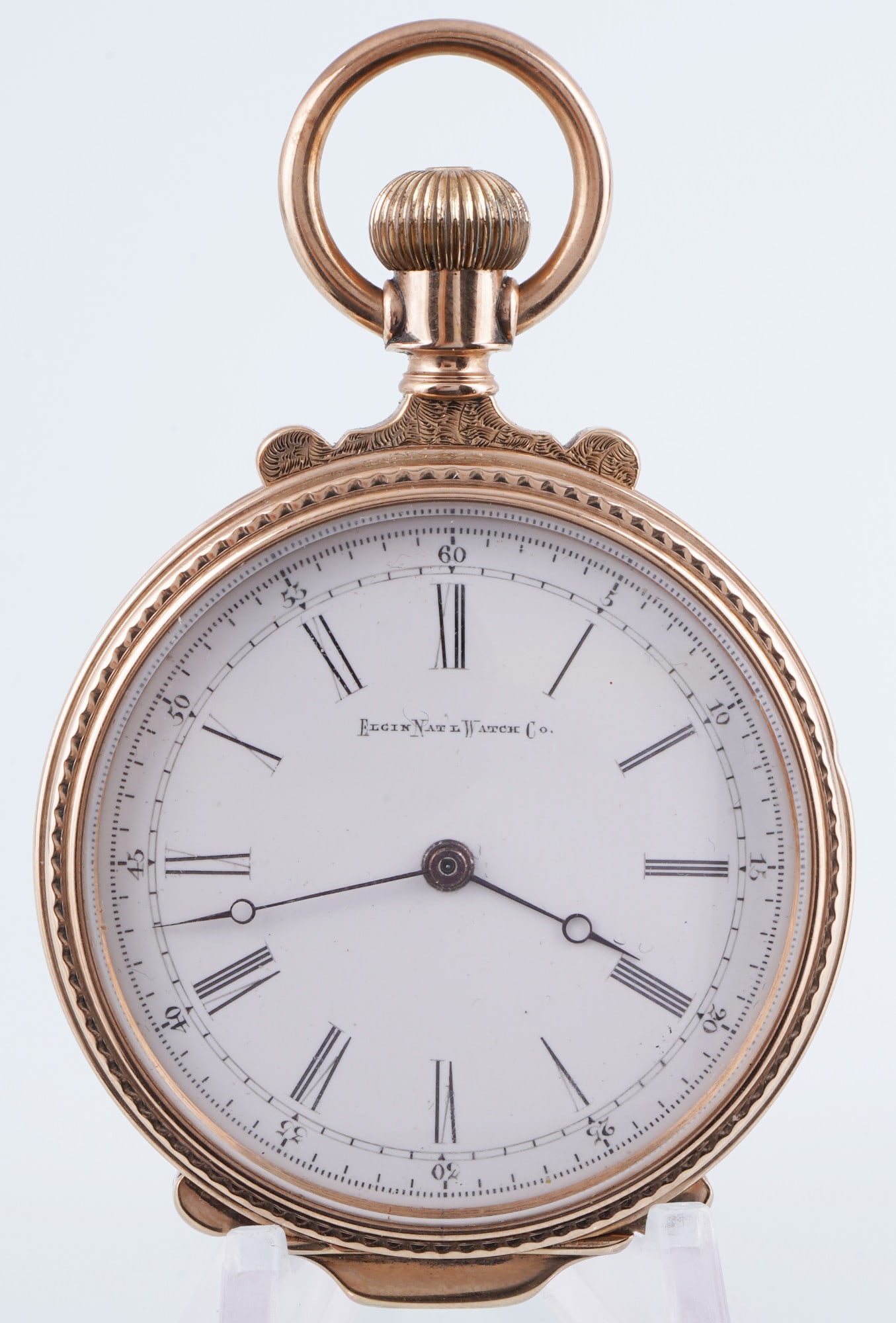 ELGIN 750 Gold Savonette Pocket Watch circa 1900: 750 gold tested, richly decorated case, both the back cover and the sides, enamel dial with the company name Elgin National Watch Co., Roman and Arabic numerals, mechanical movement with crown winding