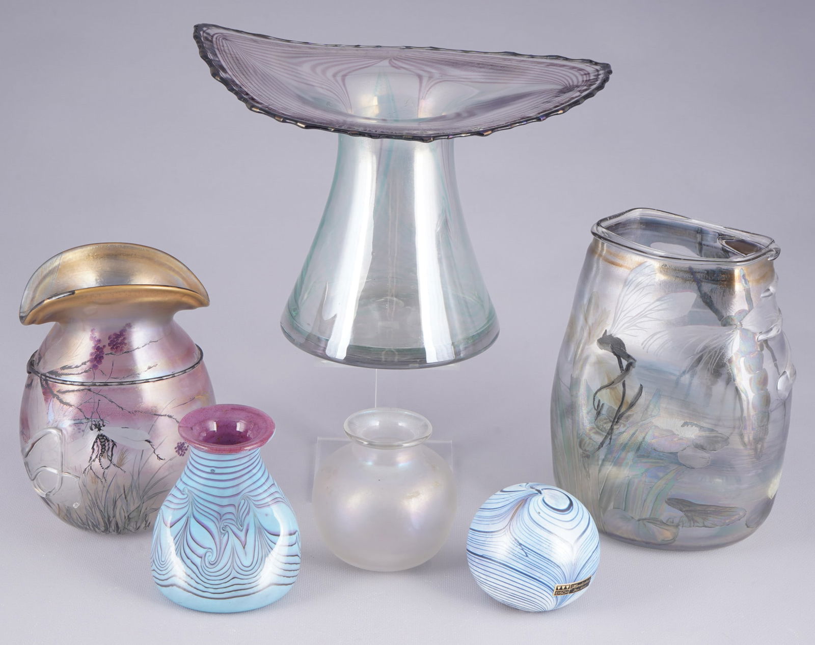 Erwin Eisch 6 studio glasses - vases with paperweight,: glass, marked Eisch on the base, partially dated and monogrammed, 1x vase '82 H 21.5 cm x W 29 cm, 1x vase M.P. '75 H 22 cm x W 10.5 cm, 1x vase B.S. '85 H 19 cm x W 13.5 cm, 1x vase '83 H 12 cm x W 1
