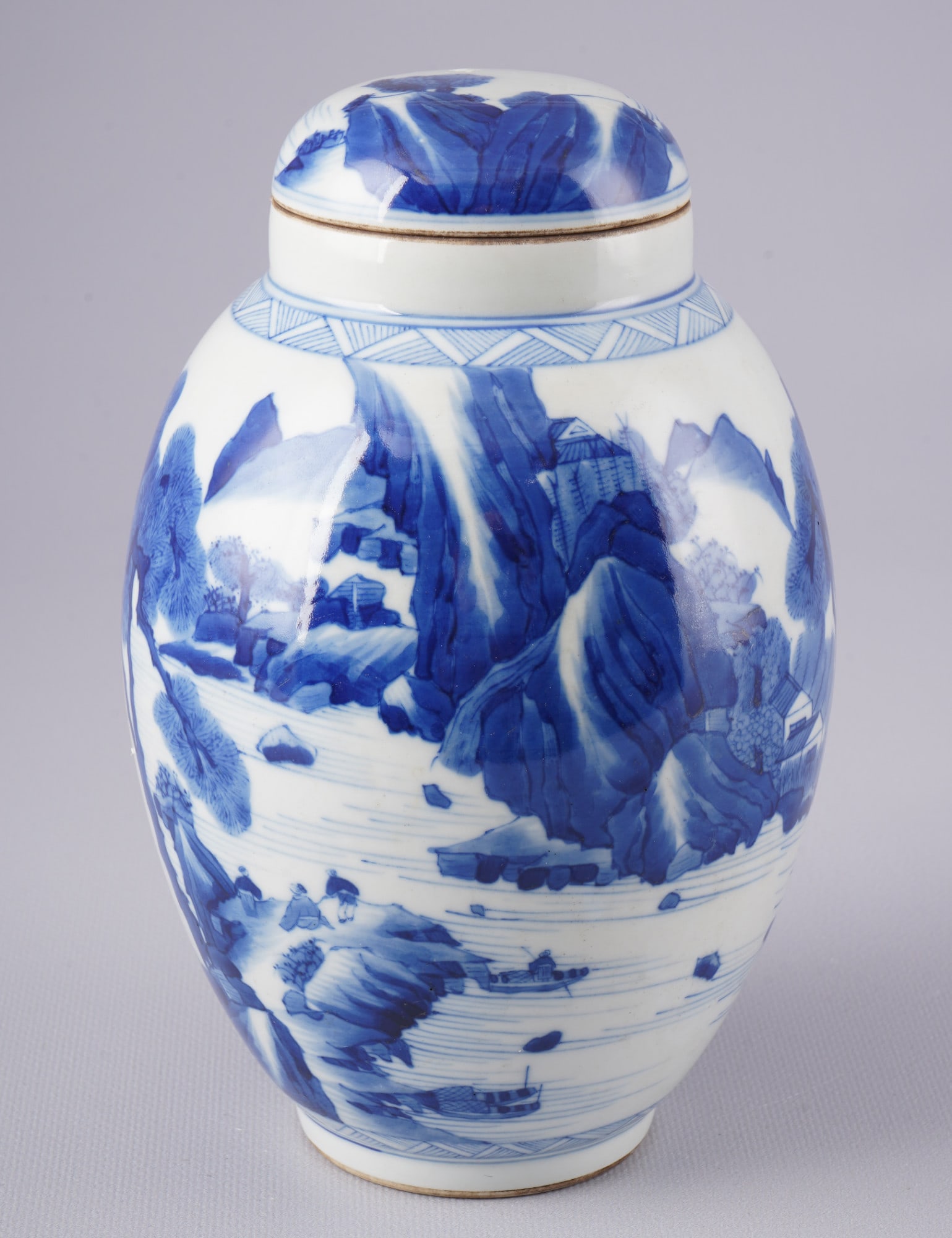 Blue and white lotus seed lidded vase, China Qing Dynasty,: Porcelain, China Qing Dynasty (1644–1911), a blue and white lotus seed lidded vase with landscape decoration (rocks, trees, a hut and figures by the water), H 20.5 cm x D 12.5 cm
