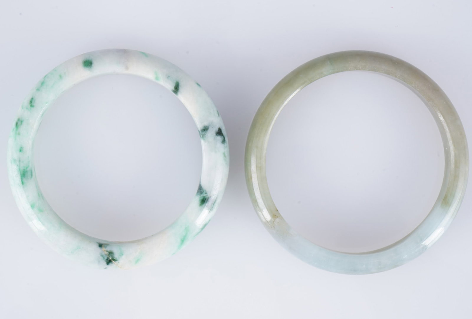 Two jadeite bangles, China, - 2