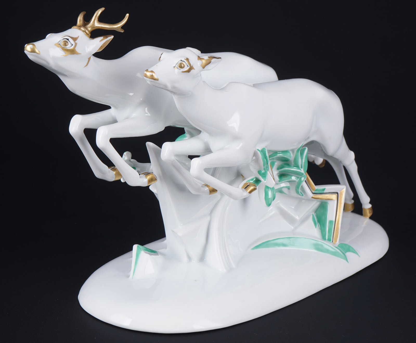 Rosenthal Art Deco deer group - Gerhard SCHLIEPSTEIN,: porcelain, green company mark, design by Gerhard SCHLIEPSTEIN (1886-1963), model no. K765, H 18.5 cm x W 32.5 cm x D 12.5 cm, touch-up on the skewer/antlers