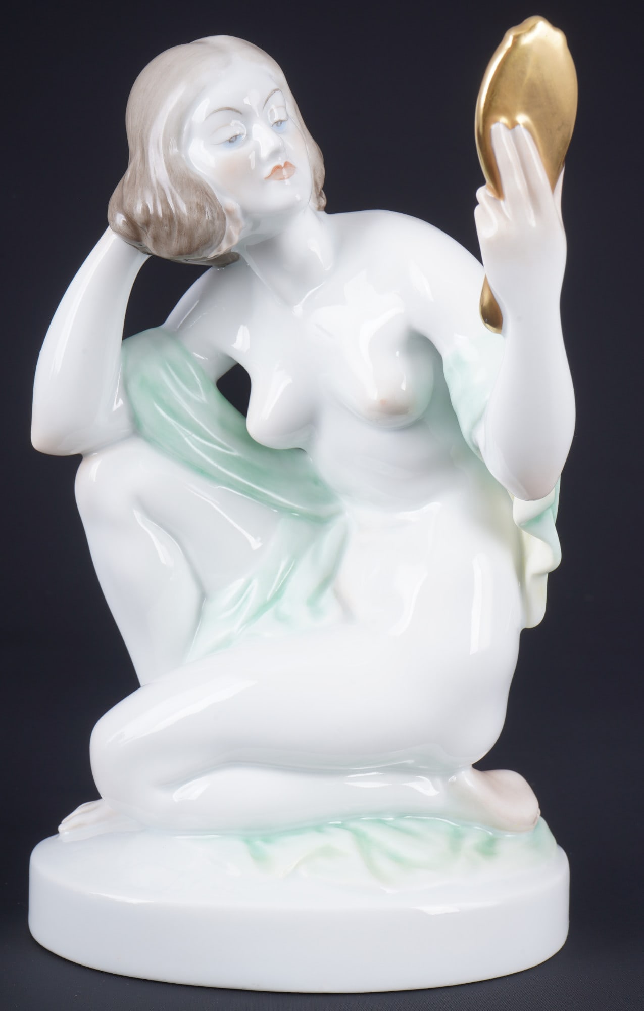 Herend kneeling nude with mirror - NAGY,: porcelain, Hungary 20th century, blue company mark, signed on the base, design by István Szilagyi NAGY (1900-1954), model no. 5723, H 23.5 cm x W 14.5 cm x D 10.5 cm