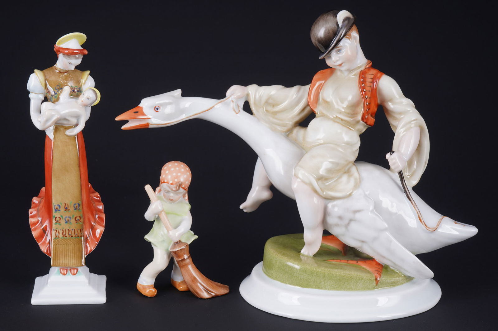 Herend 3 figures - Goose Rider, Matyó Madonna and Girl with Broom,: porcelain, Hungary 20th century, blue company mark, 1x goose rider #5515 H 20 cm x W 26 cm, 1x Matyó Madonna #5521 H 18.5 cm x W 5 cm, 1x sweeping girl # H 9 cm x W 6.5 cm