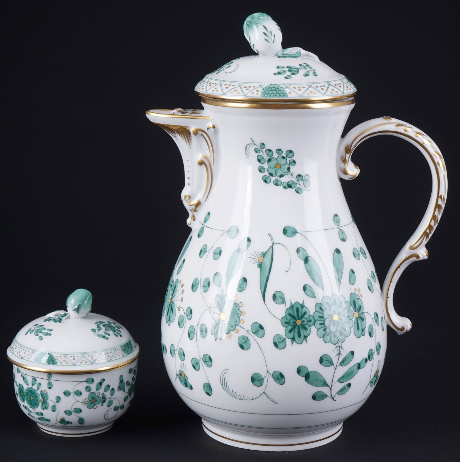 Meissen Indian Green Rich coffee pot with sugar bowl 1st choice,: porcelain, blue sword mark 1st choice, decor Indian Green Rich, decor no. 343310, 1x coffee pot H 23.5 cm x D 12 cm, 1x sugar bowl H 8 cm x D 7 cm, one lid pin of the pot broken off