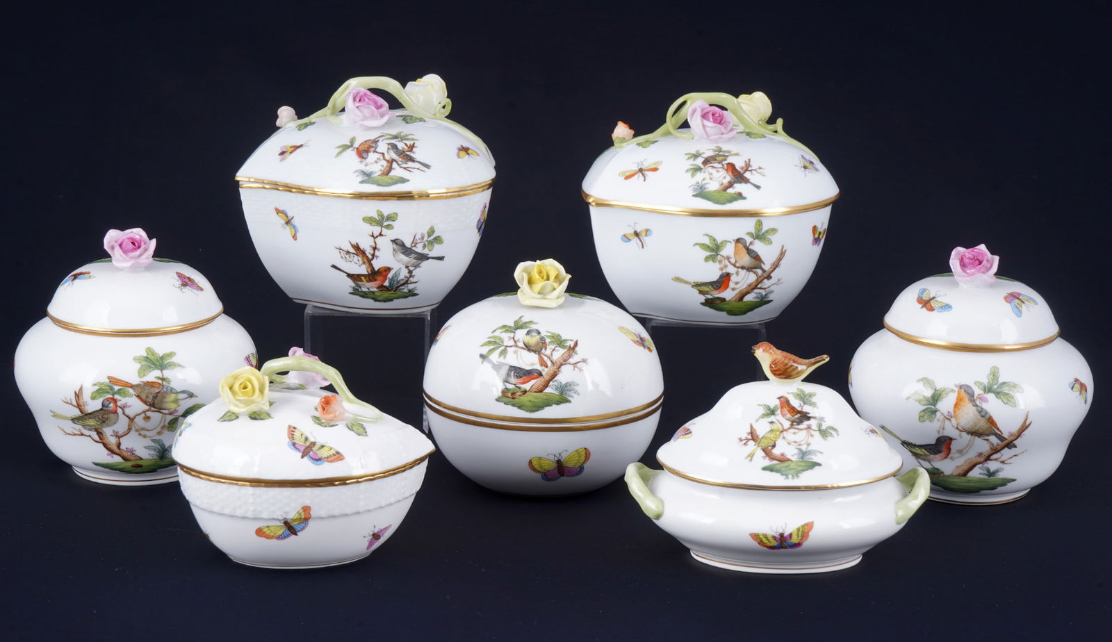 Herend Rothschild 7 lidded boxes,: porcelain, Hungary, 20th century, blue company mark, decor RO Rothschild decor, 1x heart-shaped box #6000 H 11 cm x W 12.5 cm, 1x heart-shaped box #6001 H 11 cm x W 12.5 cm, 1x heart-shaped box #6003